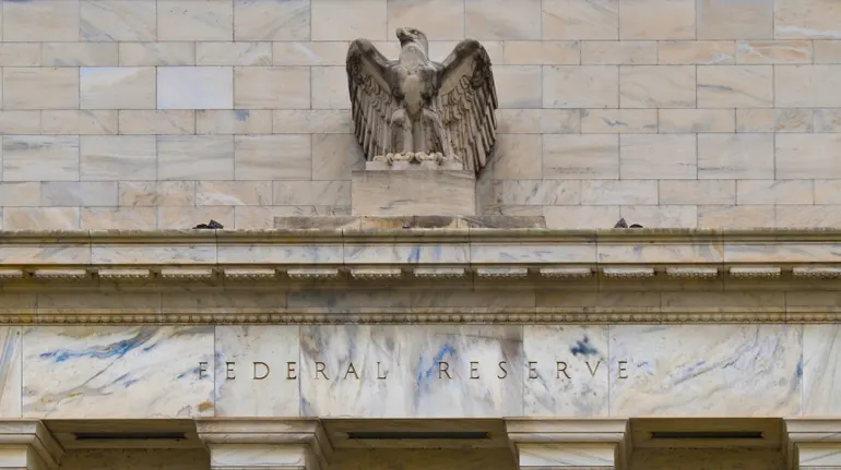 Fed on hold to see if tariff-induced inflation persists, Powell says