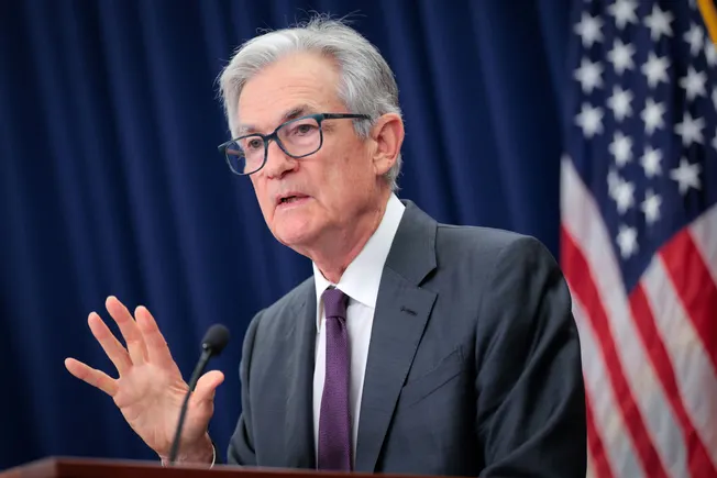 Fed trims main rate by quarter-point, forecasts two more cuts this year